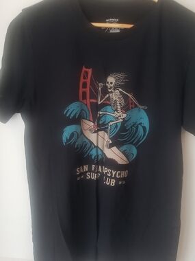 surf style Black Graphic Tee with Teal and Red Surf Skeleton
